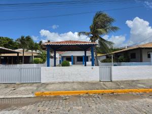 PÉ NA AREIA Paraíso