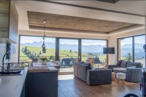 Large holiday villa with sauna and mountain views