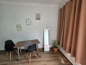 Room in a residential complex across from the airport
