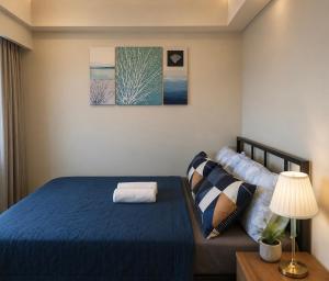 Family-Ready Skyline Retreat near BGC with Free Parking