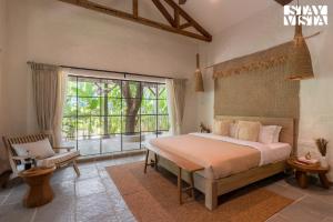 StayVista at Stories by the River with Pool & Bar
