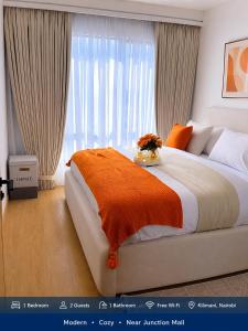 Riara One,heated pool,gym a minute walk to Junction Mall