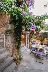 Charming Stone House with Green Courtyard