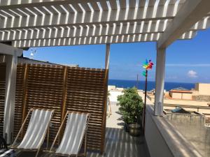 Terrazza con Vista sul Porto