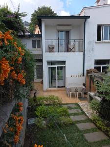 Duplex Pool Parking 24-hour security Downtown Tana