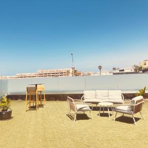 Ocean Garden suite 008 con jardín privado