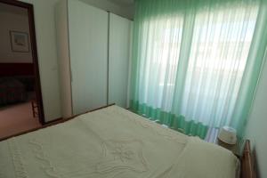 Cozy flat steps away from Lignanos golden beach