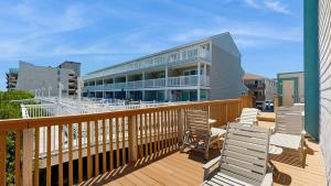 Luxurious oceanfront townhome with private deck and panoramic coastal views