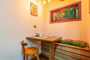 Mahuida Ruka Cabaña 3 personas Cocina Quincho Jardín Botánico