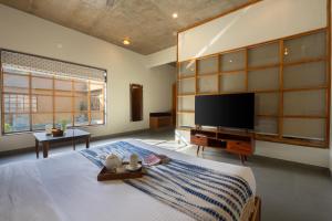 Claystone Retreat ,4BR near Old Shrinathji Temple, Udaipur