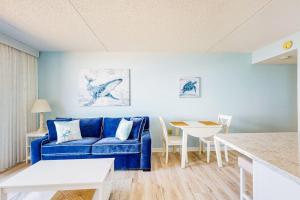 Captivating beachfront condo with balcony views pools gym & tennis court