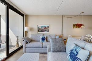Desirable beach condo with great location views balcony pools & game room