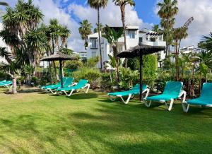 Elegant apartment with spectacular garden and pool in Estepona Costalita