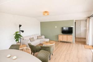 Fijn strandhuis dicht aan zee