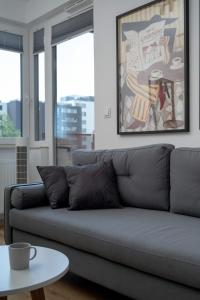 Stylish Apartment with Balcony and Underground Parking by Noclegi Renters