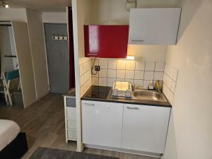 Functional studio between train station and center