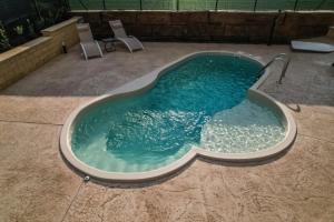 Casale Sammartano - Appartamenti con piscina comune