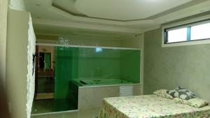 Casa pé na área com hidromassagem e piscina