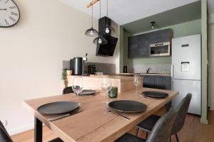 LOvalie Appartement T2 CLIMATISÉ et JARDIN