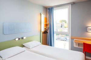 Hotels Ibis Budget Mulhouse Centre Gare : photos des chambres