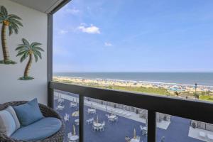 Modern beachfront studio with balcony views pool & gym