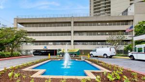 Sunny coastal condo with beach views balcony pools gym sauna & AC