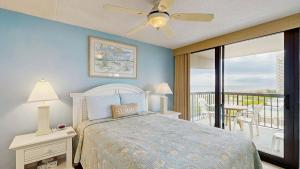 Sunny coastal condo with beach views balcony pools gym sauna & AC