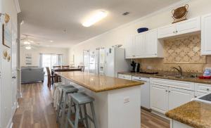 Stunning and Spacious 5 BR Condo- With Ocean Views and more! Cherry Grove Villas 402