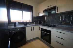 majorelle area new modern apartment with two sunny terraces and atlas mountain views