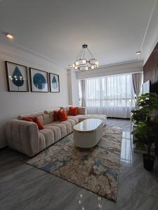 Elegant escape apartment with free parking space,fully equipped gym, swimming pool children playing ground area and amazing city views