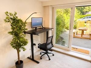 Modern North Van Escape with 2BR BBQ Workspace