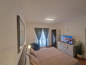 Modern and cozy studio apartment 2 min from the sea and center