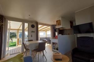 Chalet near the sea with garden and shared pool