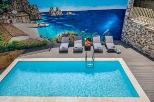 Villa La Battigia con piscina privata, fronte mare