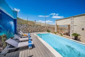 Villa La Battigia con piscina privata, fronte mare