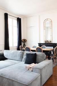 Maison Belle Époque - Immeuble haussmannien spacieux et élégant