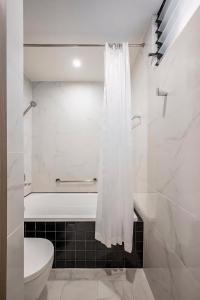 D1Mension Zenity Suites - District 1