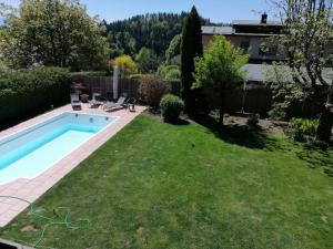 Premium-Gartenwohnung, 4 Schlafzimmer & Pool in Wörthersee Nähe