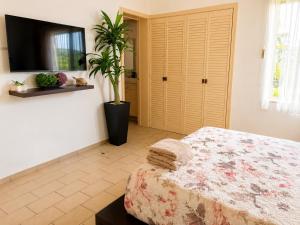 Hermoso apartamento en Manzanillo con alberca y cancha de tenis, Ideal para relajarse y disfrutar de una escapada tranquila en el paraíso tropical