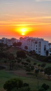Appartement panoramique, golf et océan