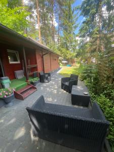 DOMEK POD SOSNAMI