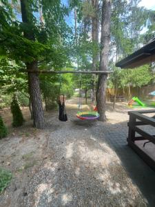 DOMEK POD SOSNAMI
