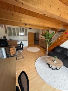 Loft with sleeping loft, balcony and underground parking