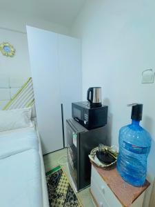 Budget friendly compact studio SQ in westlands With queen size bed fridge tv microwave pool but no cooking