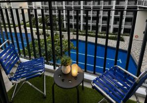 Cozy 1BR near MOA with Balcony Shore Residences