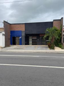 15 Mini casa com ar perto da praia estacionamento