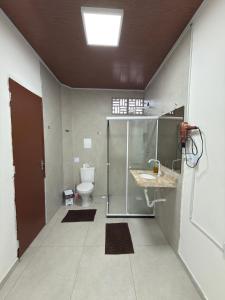 15 Mini casa com ar perto da praia estacionamento