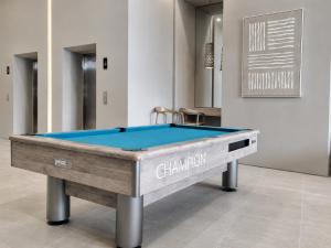 Modern studio with balcony, pool & coworking space