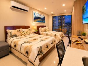 Modern studio with balcony, pool & coworking space
