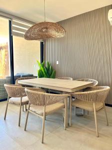 Private villa among palms in Telchac